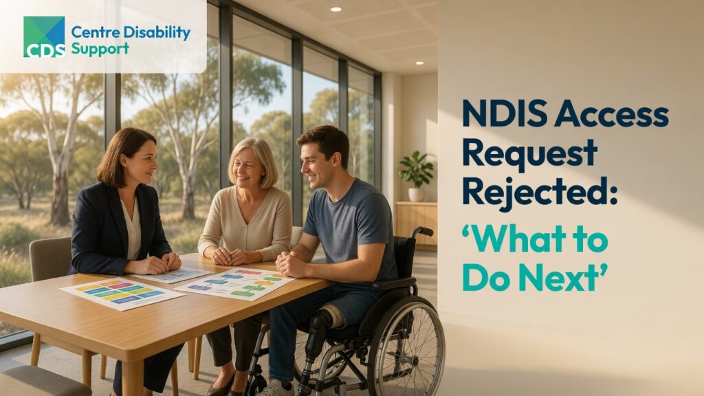 A reassuring Australian NDIS support scene featuring an adult with disability and a family member meeting with a knowledgeable NDIS support professional to review options after an access decision.